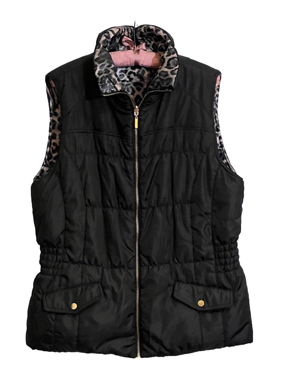 Black Quilted Puffer Vest with Reversible Leopard
Print.